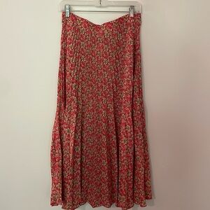 Red pleated midi skirt